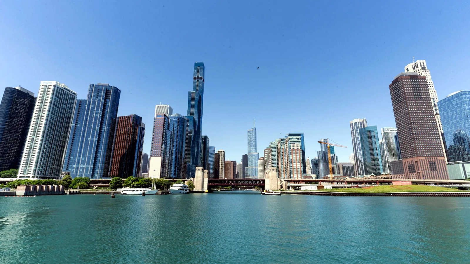 Chicago skyline along Lake Michigan with boats and downtown harbor